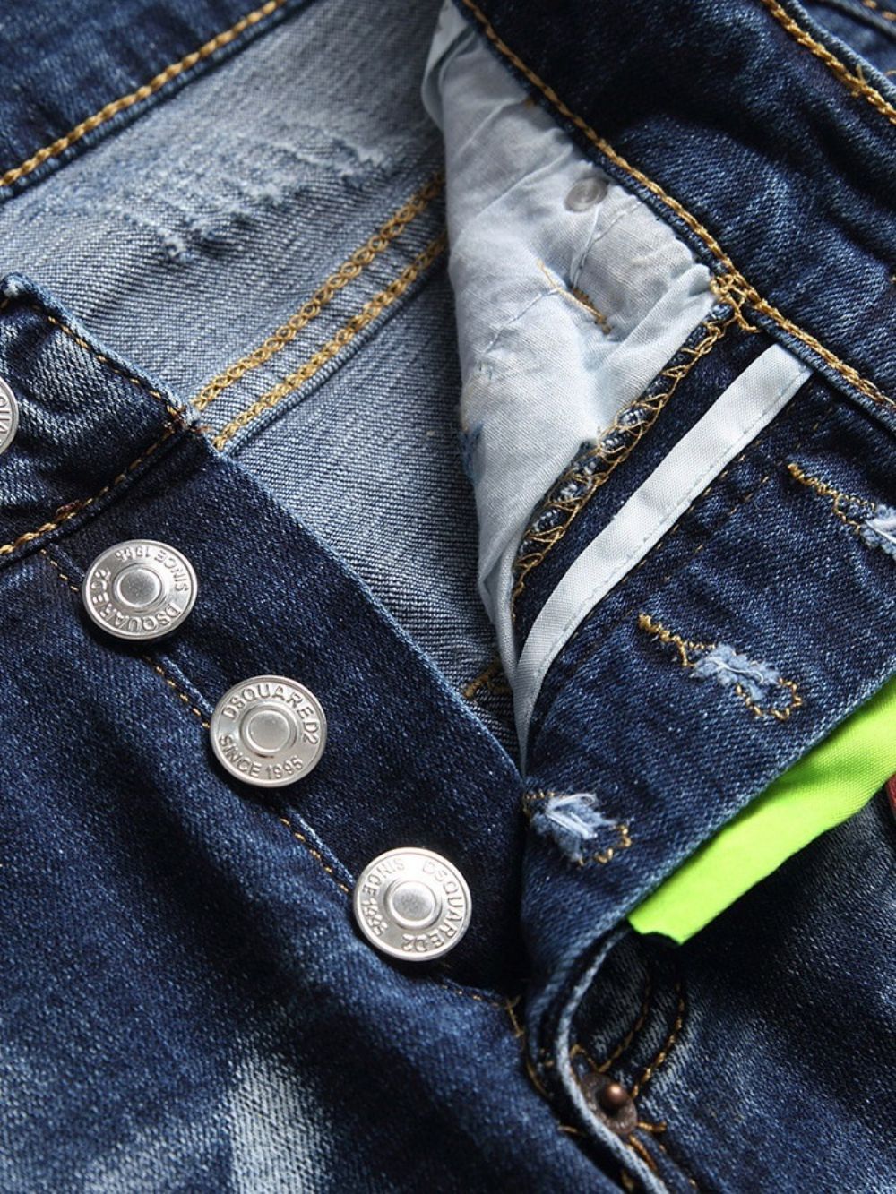 Jeans Met Kleurblokgat En Knoop Midden Taille