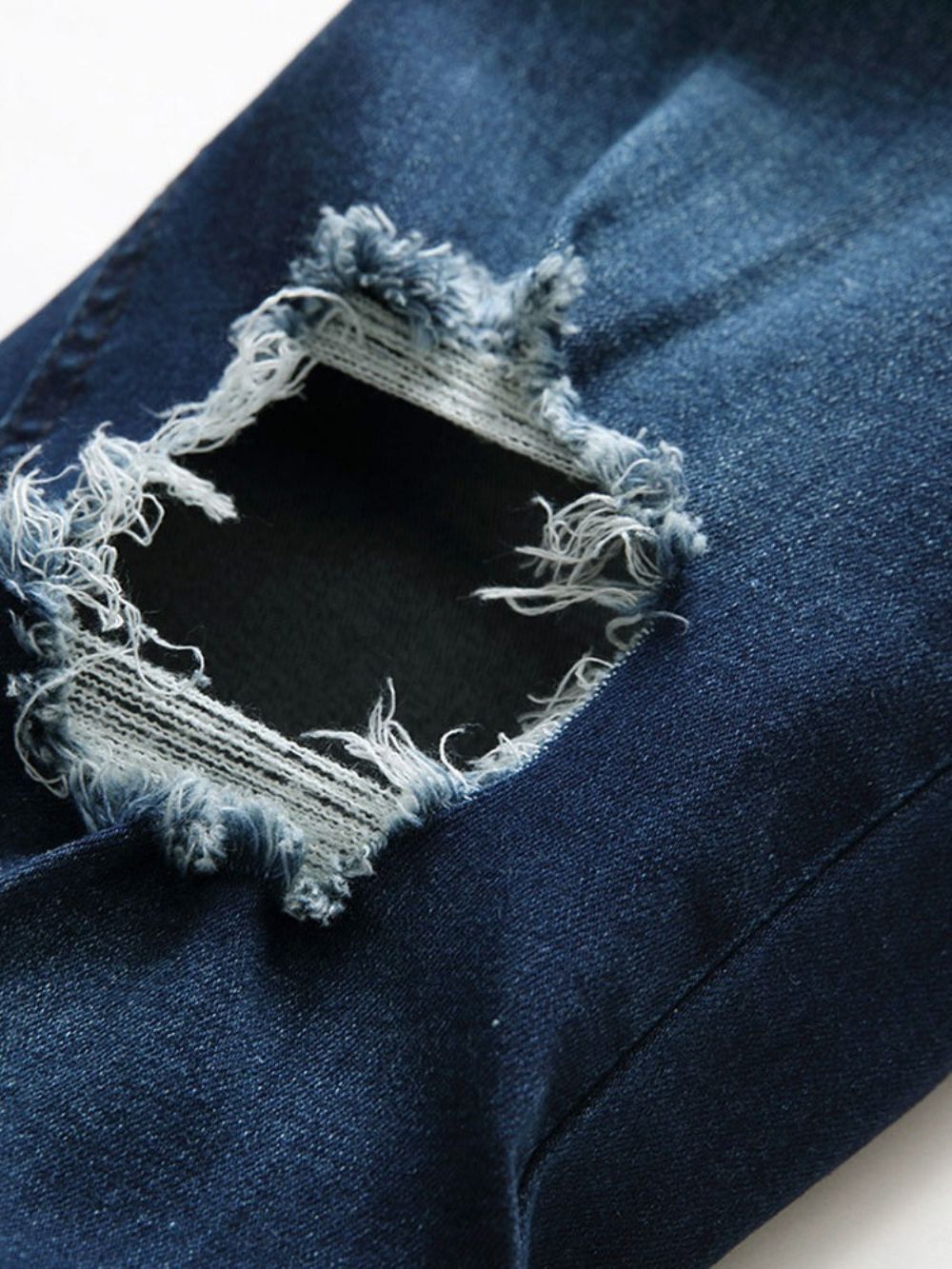 Jeans Met Ritssluiting En Middelhoge Taille Met Effen Gaten