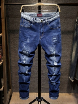 Jeans Met Ritssluiting Midden In De Taille