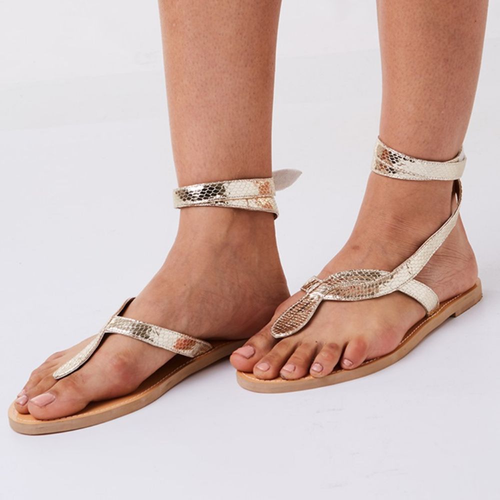 Platte Sandalen Met Gekruiste Riem In Slangenvorm