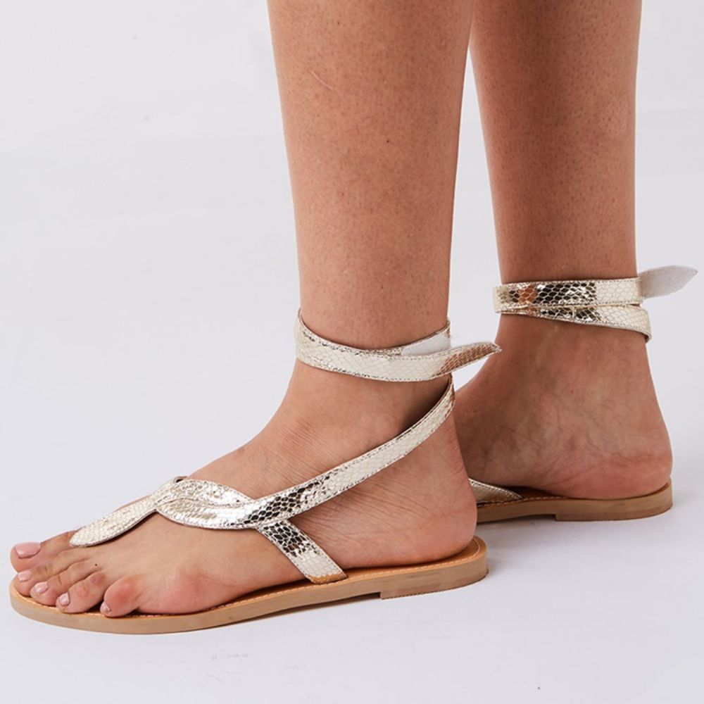 Platte Sandalen Met Gekruiste Riem In Slangenvorm